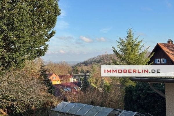 IMMOBERLIN.DE - Sympathischer Bungalow mit Potenzial, Garage & Nebengebäude in naturschöner Lage