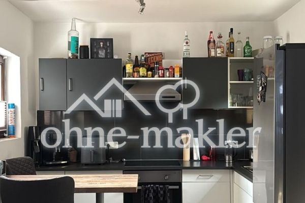 Appartement de plain-pied de 2,5 pièces avec cuisine, salle de bains, terrasse et buanderie