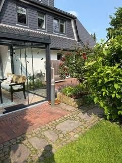Exclusive country house near Sylt with ambiance & flair – Wintergarten Terrasse