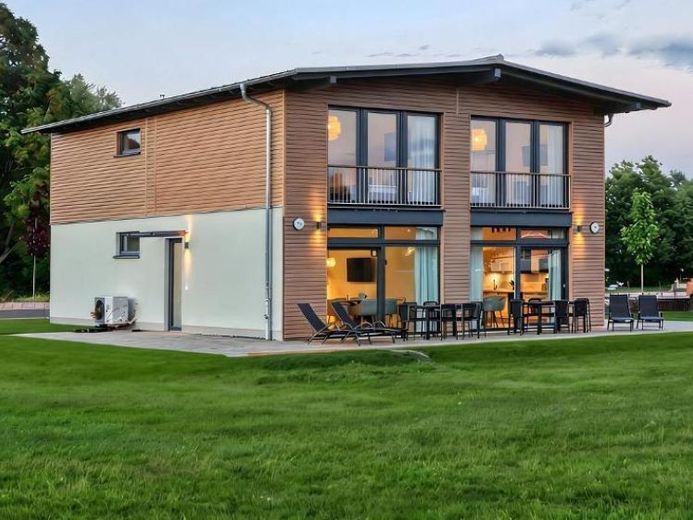 Woblitzsee’de tatil evi – KfW 40, sauna, göl konumu ve profesyonel kiralama konsepti – Fotoğraf 1
