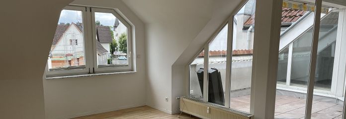 Appartement-maisonnette de 3,5 pièces avec loggia – Wohnzimmer