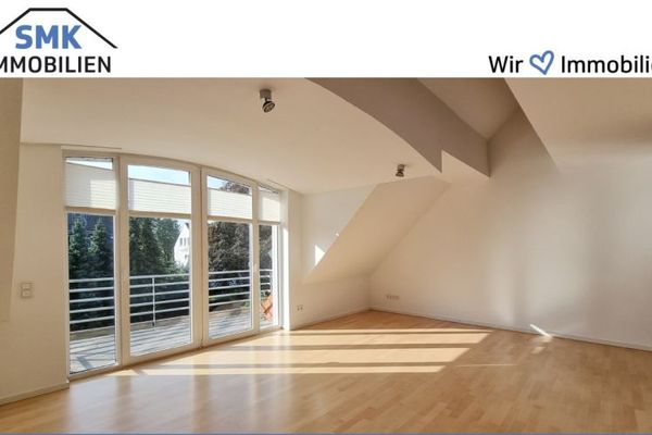 Abitare con un fascino particolare – Appartamento mansardato ristrutturato con galleria e posto auto in garage sotterraneo!