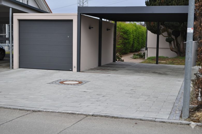 Bungalow moderne avec grand jardin, beaucoup d’intimité et A+ – Garage und Carport