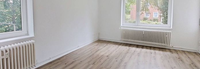 JETZT EINZIEHEN UND 1 KALTMIETE SPAREN: Helle 3-Zimmer-Wohnung mit BALKON und WANNENBAD – Ansicht I: Wohnzimmer