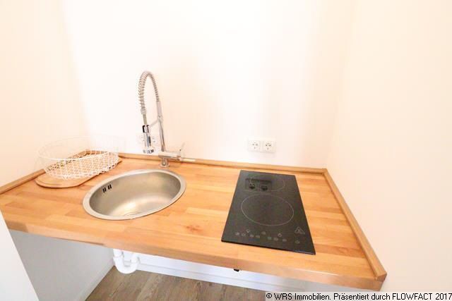 WRS Immobilien - 1 Zimmer Wohnung in Bornheim mit Balkon und Kochnische - Erstbezug nach Sanierung – Kochnische - Spüle + Induktionskochfeld
