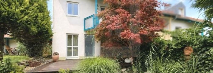 Verzorgd eindhuis in een rij met Feng-Shui-tuin op een toplocatie in Oberbeuren