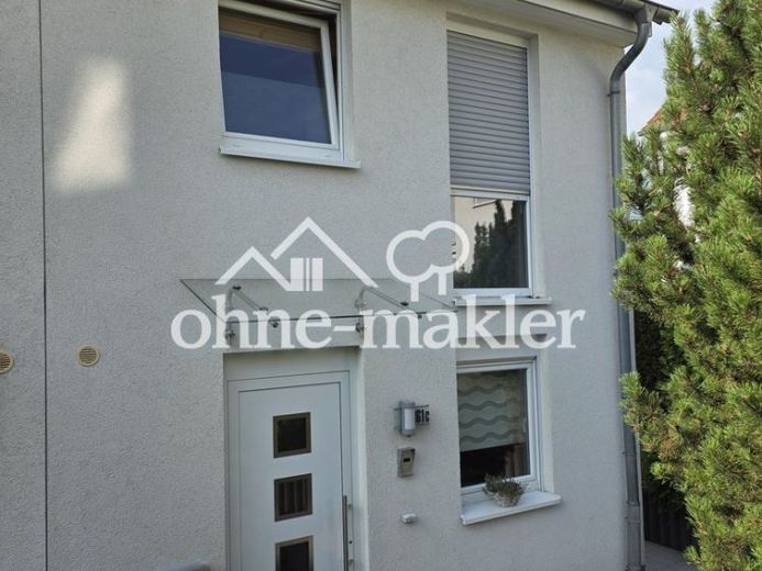 Gepflegtes Reihenendhaus mit schönem Garten, überdachter Terrasse, Kamin und Carport – Foto 1