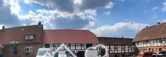 Hofstelle mit 7 Mietwohnungen, Lagerhalle, Garagen, Abstellräumen
