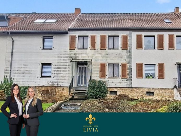 Charmantes Reihenmittelhaus mit Potenzial – schreiben Sie hier Ihr neues Kapitel – फोटो 1