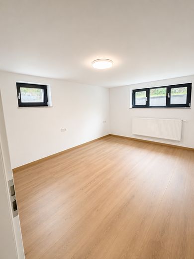Sanierte ein Familienhaus – Anliegewohnung UG Zimmer