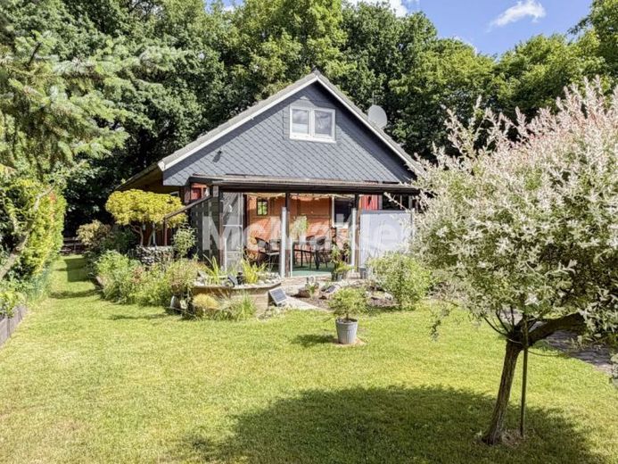 Eigenheim mit ca. 72,92 m² wohnlich nutzbarer Fläche, Garten und Stellplatz in ruhiger Randlage – Foto 1