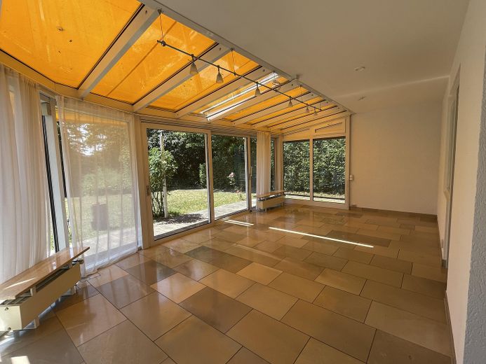 Casa progettata da un architetto a mezza collina – Wintergarten