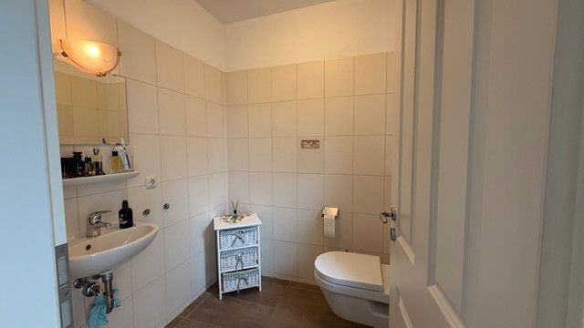 Einziehen & wohlfühlen: Modernisiertes Einfamilienhaus mit Wintergarten in Varel-Büppel – Foto 8