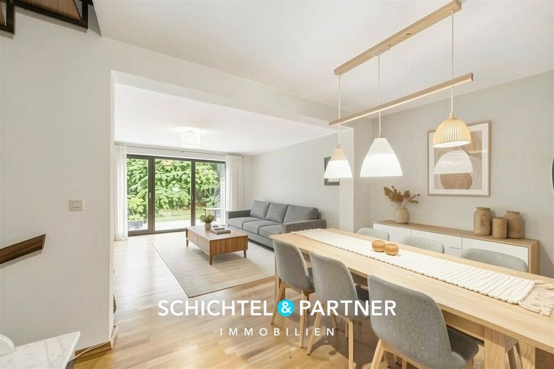 Hulsberg | Vermietetes Reihenhaus mit fünf Etagen, Garten und Garage – S&amp;P | Wohn- und Essbereich (digitales Staging)