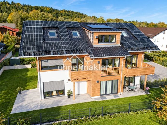 Doppelhaushälfte in Holzmassivbauweise – KfW 40 Plus, ca. 150 m², S/W-Garten & beheiztes KG – Foto 1