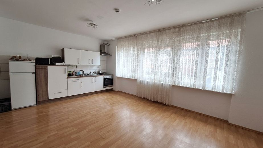 Wohnzimmer mit Küche
