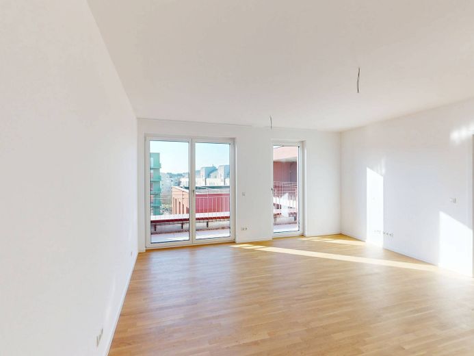Splendido appartamento di 3 locali con cucina a vista nel nuovo quartiere residenziale "Ferdinands Garden" – Ansicht I: Wohn- und Esszimmer