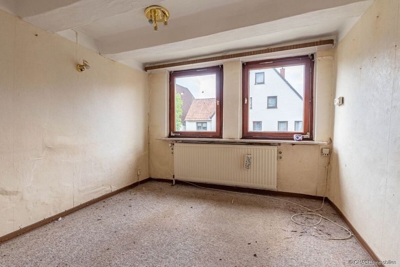 TOP-Lage zentral in Barntrup - Baugrundstück mit abrissreifem Fachwerkhaus! – EG - Wohnraum 1