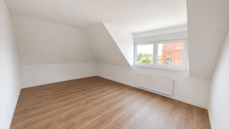 Quasi-apartment within a 3-person shared flat with a view over Leipzig – mittleres WG-Zimmer