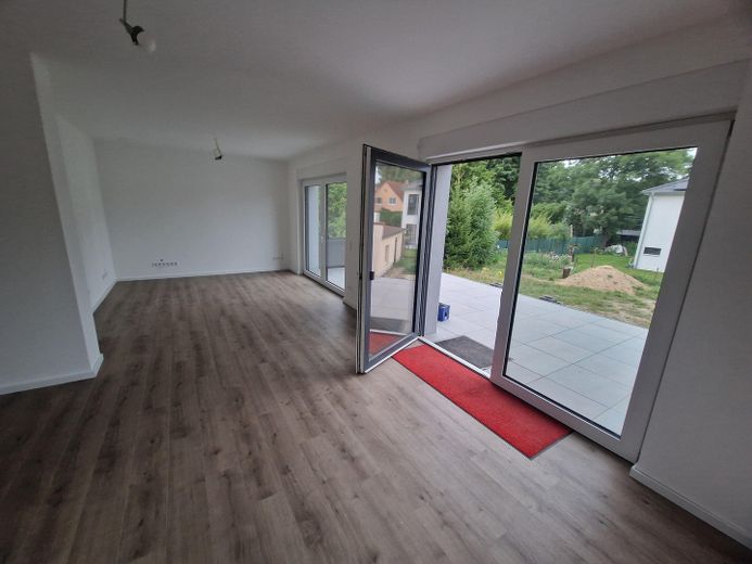 Erstbezug in Zepernick – Provisionsfreie KfW-40-EE Stadtvilla auf über 1.000 m² Grundstück – EG Ess- Wohnbereich + Terrasse