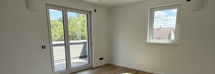 Erstbezug: Exklusives Penthouse 1-Zimmer-Apartment in hochwertigem Neubau mit Einbauküche – Wohnen und Schlafen