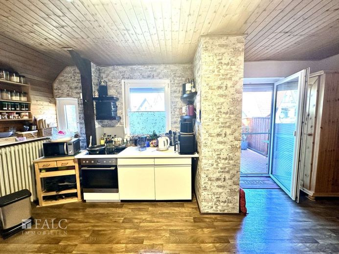 Einfamilienhaus mit Einliegerwohnung und Baugrundstück in zentraler Lage von Himmelpforten – Küche OG