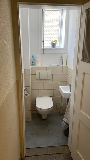 Toilette auf dem Gang