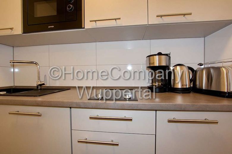 Business- Apartment im Industrial-Style mit Süd-Balkon, DSL-Wifi und Reinigungsservice – e68af0114d5644666330b3d50e3f351f5213ef55.jpg