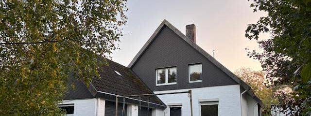 Großzügiges Zweifamilienhaus mit Solaranlage, Wintergarten & großem Grundstück in Neuberend – Ansicht vom hinteren Garten