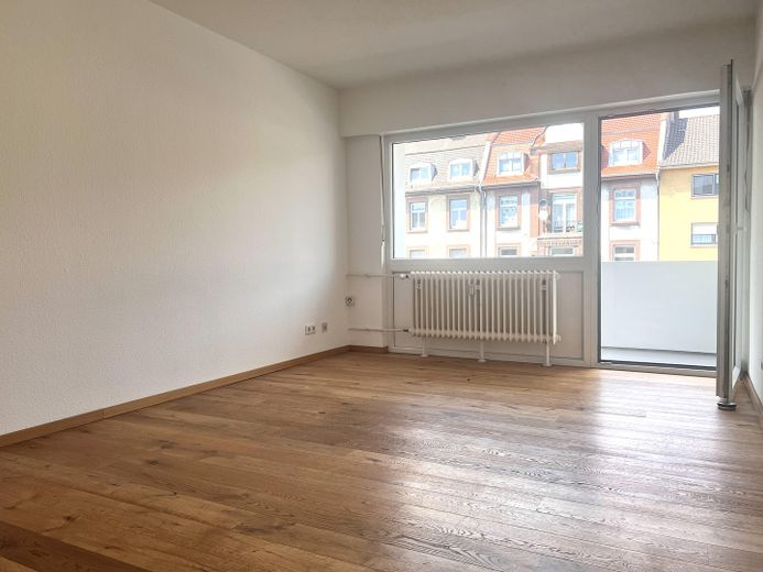 Wohnzimmer mit Balkon