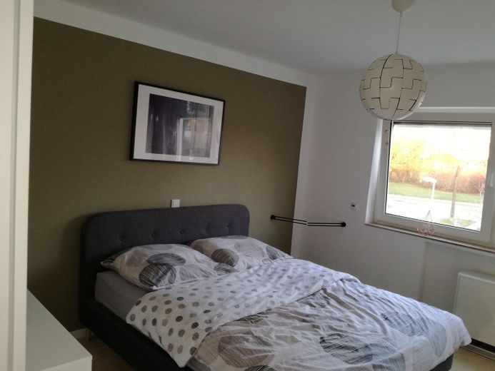 Spacious 4-room apartment with 2 bathrooms, balcony & garage, and an incredible view – Schlafzimmer