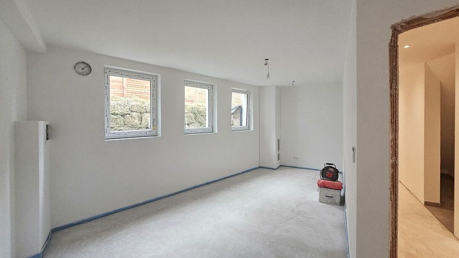Stadtvilla mit kleinem Garten - Neubau Massivholzhaus am Waldrand mit 180m² Wohnfläche – Wohnraumqualität im UG
