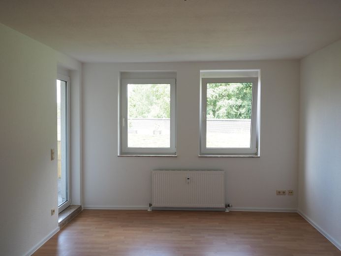 2 pièces à Birkenfeld : de l’espace pour votre quotidien – Wohnzimmer