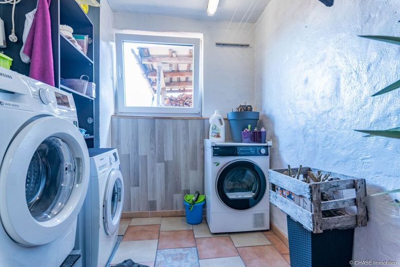Großzügiges 3-Familienhaus in idyllischer Feldrandlage von Hessisch Oldendorf - OT Rohden! – EG Hp - Waschküche