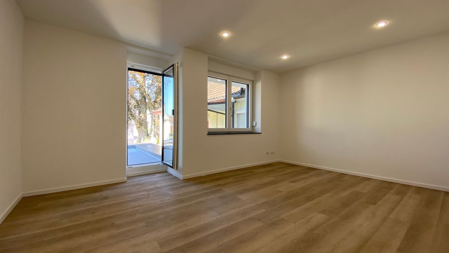 4-Zimmerwohnung in Traumlage mit Kachelofen, Balkon, Dachterrasse, Gästebad und Garage – Zimmer 3
