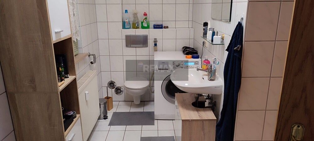 2 Zimmer Erdgeschosswohnung -  Einmaliges Rendite Objekt im Franz Klinkert Haus – Badezimmer