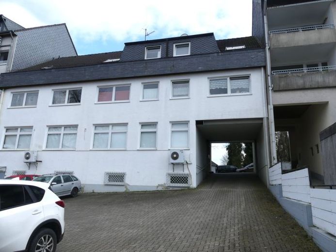 Gepflegtes und vermietetes Wohn- und Geschäftshaus in zentrumsnaher Lage – Foto 1