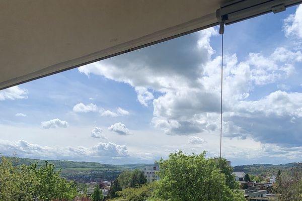 Living with a panoramic view over Aalen | Modernized 3.5-room apartment with a large west-facing balcony and elevator