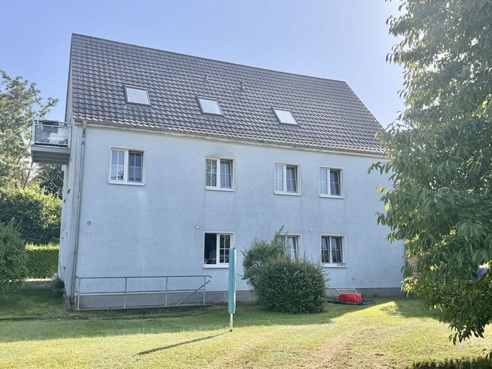 HORN IMMOBILIEN ++ Rechlin an der Müritz vermietetes Mehrfamilienhaus zu verkaufen – Hausansicht Rückseite