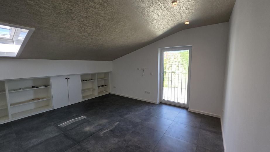 Appartamento mansardato di 2,5 locali – Schlafzimmer