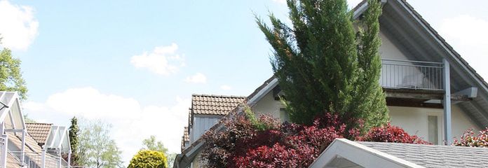 Stadtnahe lichtdurchflutete Maisonettewohnung mit Südbalkon am Waldrand – Wohnanlage