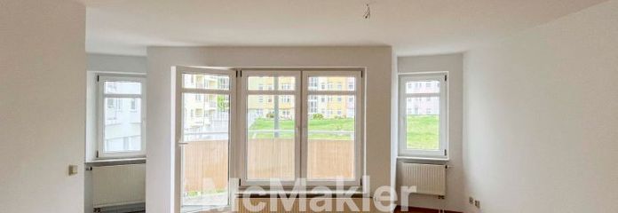 Charmante Maisonettewohnung mit Balkon, Garage und viel Wohnqualität