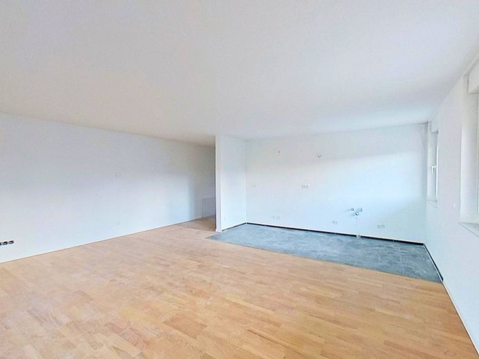 **PREMIÈRE OCCUPATION** Appartement moderne de 2 pièces avec BALCON ensoleillé – Ansicht IV: Wohn- und Esszimm…
