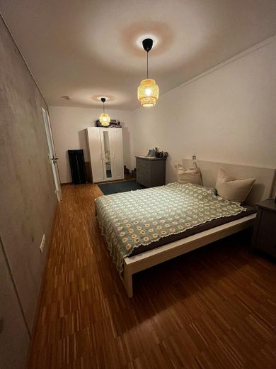 Modern 2-room apartment with underground parking space – Schlafzimmer
