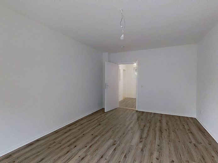 Moderne 2-Zimmer-Wohnung mit BALKON und einer durchdachten Raumaufteilung – Ansicht II: Wohn- und Esszimm…