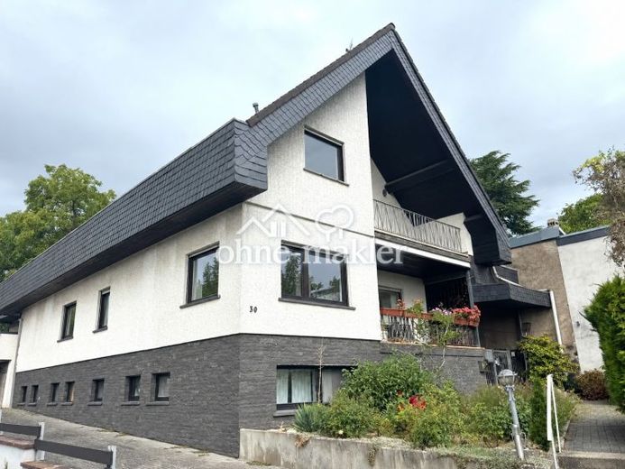 Vielseitiges Mehrfamilienhaus mit 3 Einheiten & attraktivem Baugrundstück – Zdjęcie 2