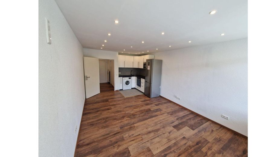 Wohnzimmer mit Küche