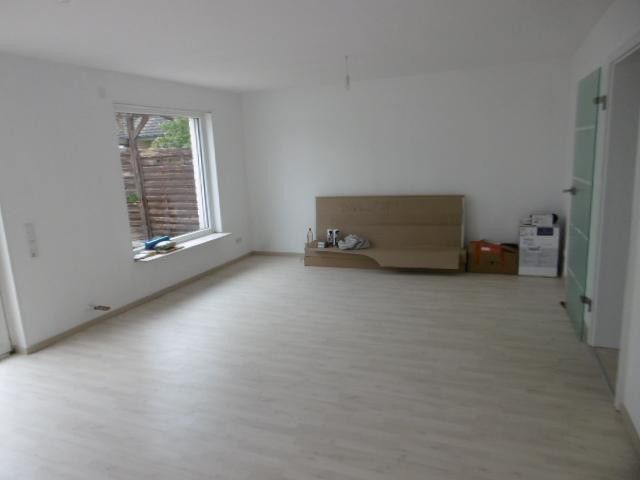 Wohnzimmer mit Glastür