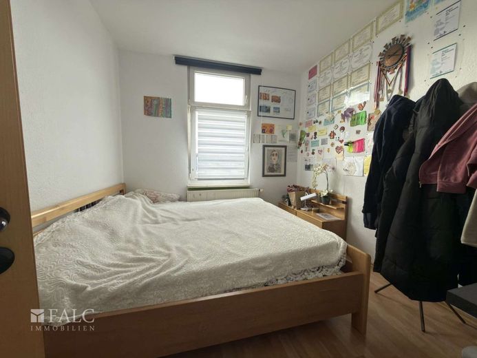 9,23 % Rendite ! Gepflegtes Wohn- und Geschäftshaus in zentraler Lage am Hasten – Schlafzimmer