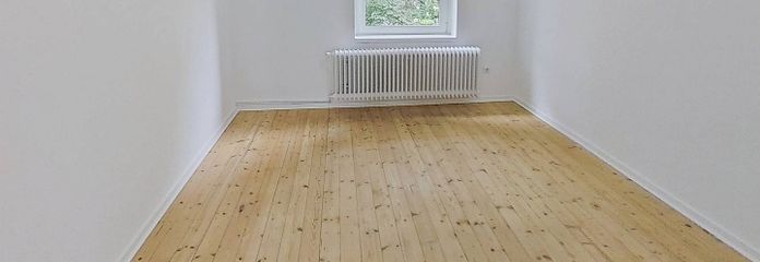 Modern gün ışığı alan banyosu ve büyük mutfağı bulunan konforlu 2 odalı daire – Ansicht I: Wohnzimmer